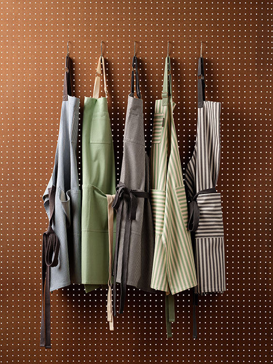 bib apron with adjustable strap and pocket